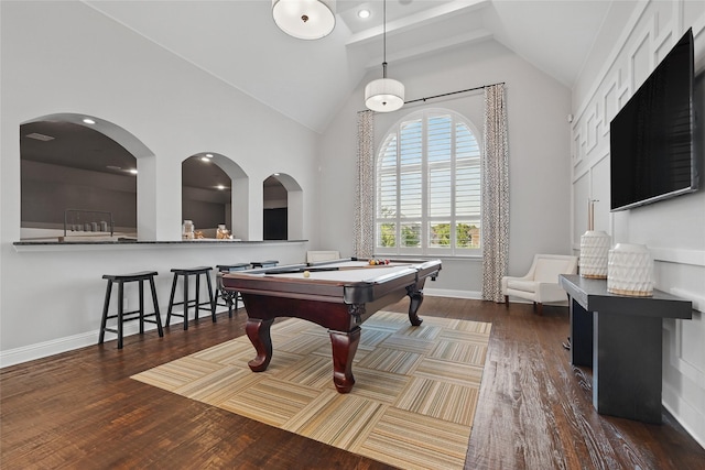 rec room featuring baseboards, wood finished floors, high vaulted ceiling, and billiards