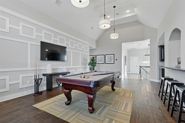 game room featuring dark wood finished floors, visible vents, pool table, and high vaulted ceiling