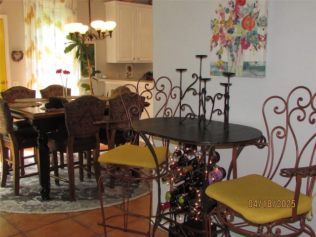 2709 Lakeside Dr, Burleson, TX 76028 - dining space with tile patterned floors and a notable chandelier