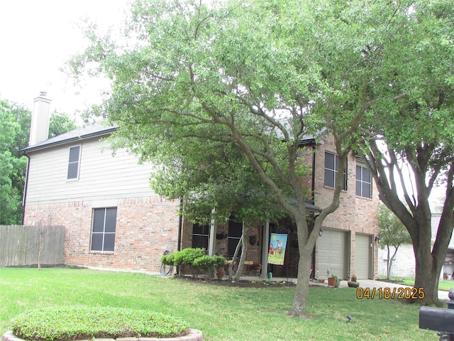2709 Lakeside Dr, Burleson, TX 76028 - exterior space with a chimney, fence, an attached garage, brick siding, and a front yard