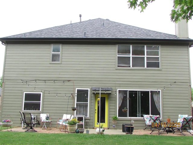 2709 Lakeside Dr, Burleson, TX 76028 - rear view of house featuring a patio area and a shingled roof
