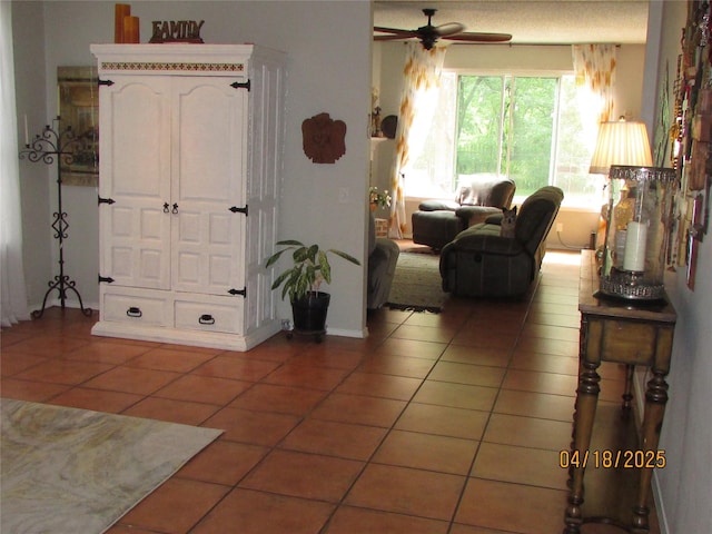 2709 Lakeside Dr, Burleson, TX 76028 - living room featuring a ceiling fan and light tile patterned floors