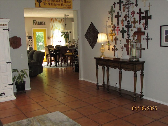 2709 Lakeside Dr, Burleson, TX 76028 - corridor with tile patterned floors and baseboards