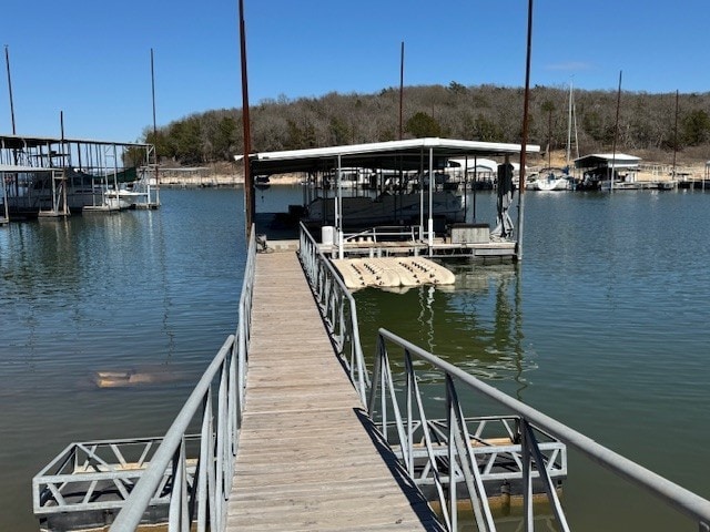 view of dock with a water view