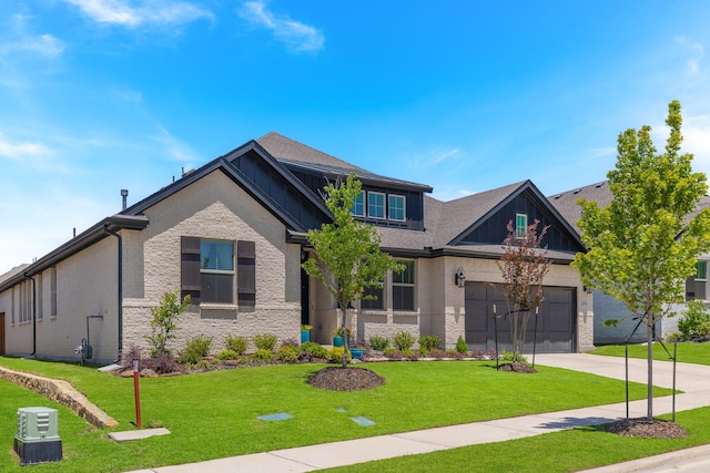1236 Monterra Way, Fate, TX 75087 - craftsman-style house with concrete driveway, an attached garage, a front lawn, stone siding, and board and batten siding