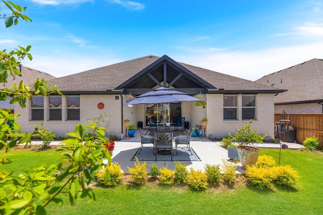 1236 Monterra Way, Fate, TX 75087 - back of property with a patio and roof with shingles