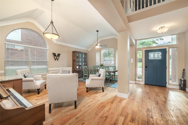 7612 Trevino Dr, Plano, TX 75025 - entrance foyer with high vaulted ceiling, light wood-style floors, and a ceiling fan