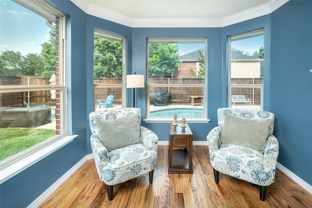 7612 Trevino Dr, Plano, TX 75025 - sitting room featuring wood finished floors, plenty of natural light, baseboards, and ornamental molding