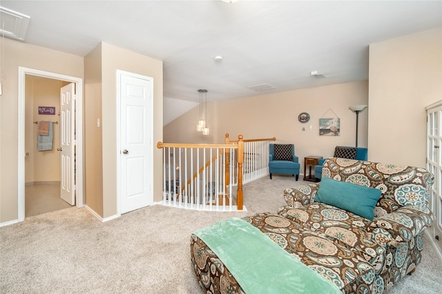 7612 Trevino Dr, Plano, TX 75025 - living area with attic access, carpet flooring, an upstairs landing, and baseboards