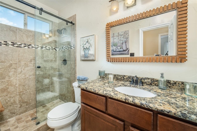 7612 Trevino Dr, Plano, TX 75025 - full bathroom with a stall shower, toilet, and vanity