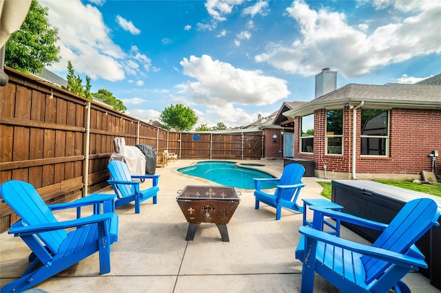 7612 Trevino Dr, Plano, TX 75025 - view of patio with an outdoor fire pit and a fenced backyard