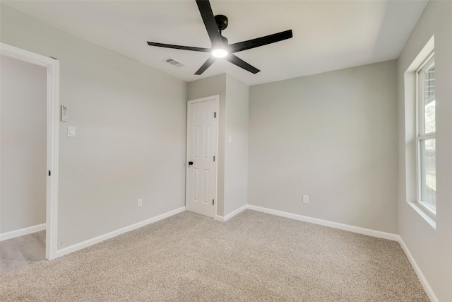 1005 Osborne Ln, Fort Worth, TX 76112 - unfurnished bedroom featuring light carpet, visible vents, and baseboards