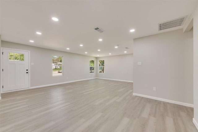 1005 Osborne Ln, Fort Worth, TX 76112 - unfurnished room featuring recessed lighting, visible vents, light wood finished floors, and baseboards