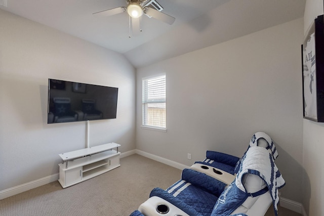 unfurnished room with lofted ceiling, a ceiling fan, baseboards, and carpet