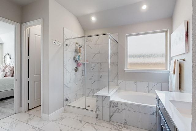 bathroom featuring a shower stall, a garden tub, marble finish floor, and vanity