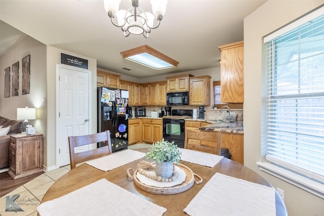 4910 Coyote Run, Abilene, TX 79602 - dining space featuring a chandelier and light wood-style floors