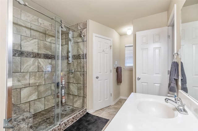 4910 Coyote Run, Abilene, TX 79602 - full bath with a shower stall, vanity, and baseboards