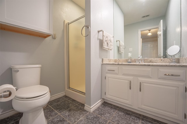full bath featuring visible vents, toilet, vanity, baseboards, and a stall shower