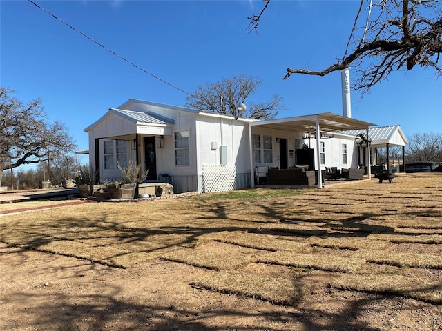 1609 Beech St, Cisco, TX 76437 - rear view of house featuring an outdoor living space