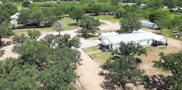 1609 Beech St, Cisco, TX 76437 - view of subject property with a tree filled landscape