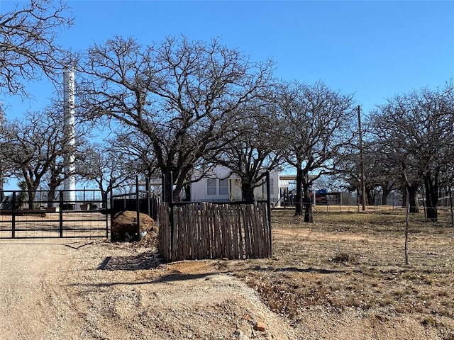 view of yard with a gate and fence