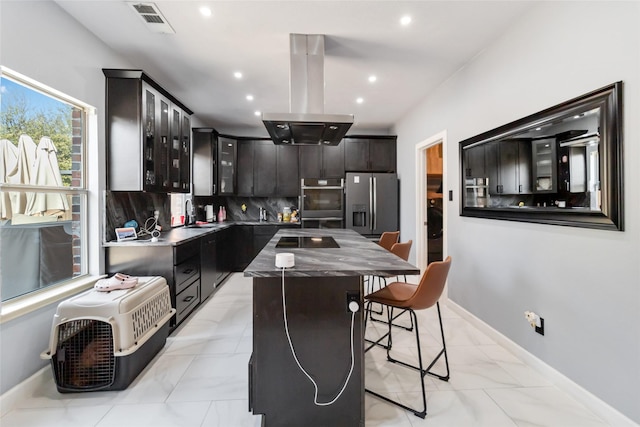 2409 Eisenhower Dr, Mckinney, TX 75071 - kitchen with a kitchen island, island exhaust hood, tasteful backsplash, marble finish floor, and stainless steel appliances