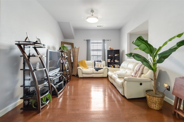 2409 Eisenhower Dr, Mckinney, TX 75071 - sitting room featuring visible vents, baseboards, and wood finished floors