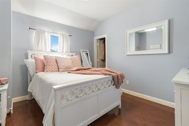 2409 Eisenhower Dr, Mckinney, TX 75071 - bedroom featuring baseboards, lofted ceiling, and dark wood-style floors