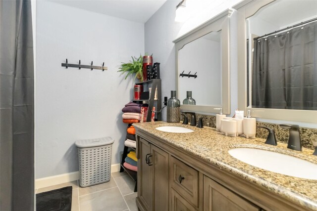 2409 Eisenhower Dr, Mckinney, TX 75071 - bathroom with tile patterned flooring, a sink, curtained shower, and double vanity
