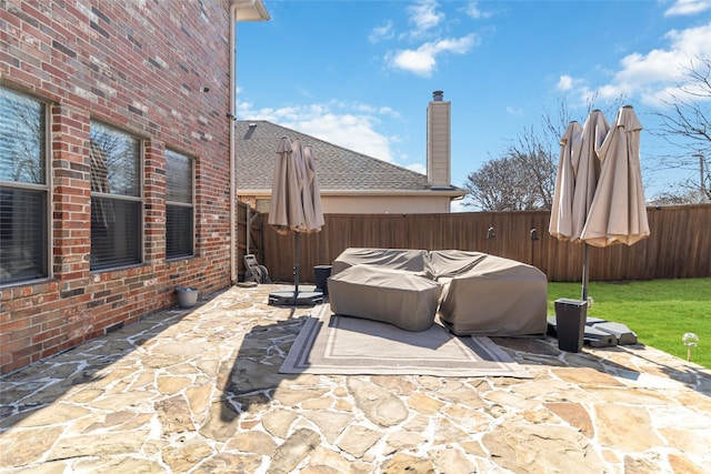 2409 Eisenhower Dr, Mckinney, TX 75071 - view of patio / terrace with a fenced backyard