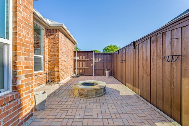 10401 Max Ln, Frisco, TX 75035 - view of patio with an outdoor fire pit and a gate