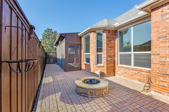 10401 Max Ln, Frisco, TX 75035 - view of patio / terrace featuring a fire pit and a gate