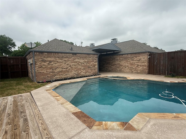 view of swimming pool featuring a fenced in pool and a fenced backyard