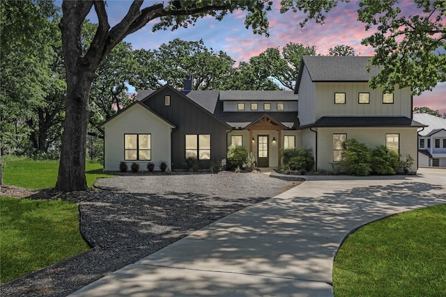 8919 Southern Shore Ct, Kemp, TX 75143 - modern farmhouse featuring roof with shingles, a yard, board and batten siding, and curved driveway
