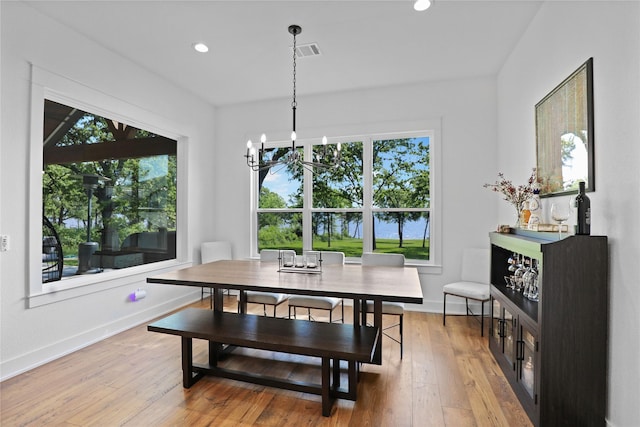 8919 Southern Shore Ct, Kemp, TX 75143 - dining room with a chandelier, light wood-style flooring, and recessed lighting