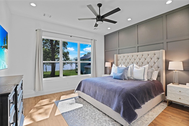 8919 Southern Shore Ct, Kemp, TX 75143 - bedroom featuring recessed lighting, light wood-style flooring, and ceiling fan