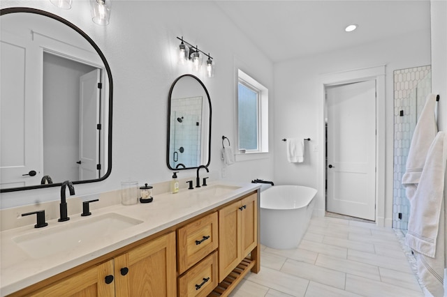 8919 Southern Shore Ct, Kemp, TX 75143 - full bath featuring a shower, a freestanding bath, a sink, and double vanity