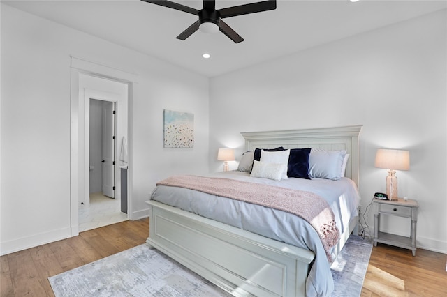 8919 Southern Shore Ct, Kemp, TX 75143 - bedroom featuring baseboards, a ceiling fan, wood finished floors, and recessed lighting
