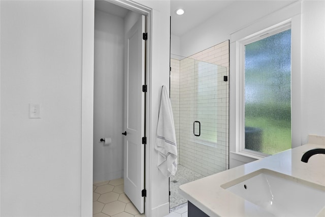 8919 Southern Shore Ct, Kemp, TX 75143 - full bathroom with a shower stall, vanity, tile patterned flooring, and recessed lighting