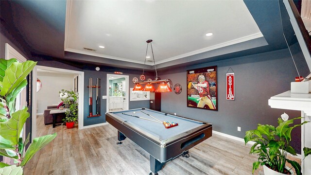 game room featuring pool table, ornamental molding, and wood finished floors