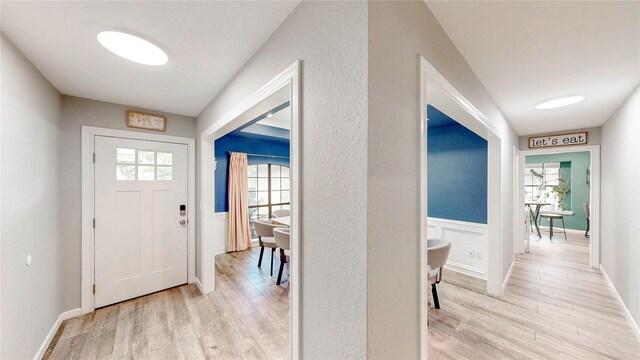 entryway with light wood-style flooring