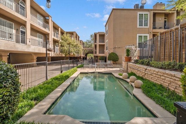 3311 Blackburn St Unit 104, Dallas, TX 75204 - community pool featuring fence, a residential view, and a patio