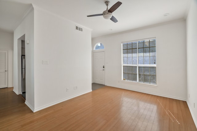 3311 Blackburn St Unit 104, Dallas, TX 75204 - spare room with a healthy amount of sunlight, wood finished floors, and visible vents