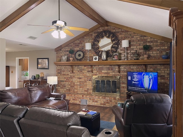living room with brick wall, a ceiling fan, and visible vents
