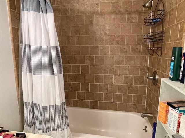 bathroom with shower / bathtub combination with curtain