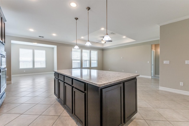 2101 Flagship Ct, Frisco, TX 75036 - kitchen with crown molding, open floor plan, a ceiling fan, light tile patterned flooring, and hanging light fixtures