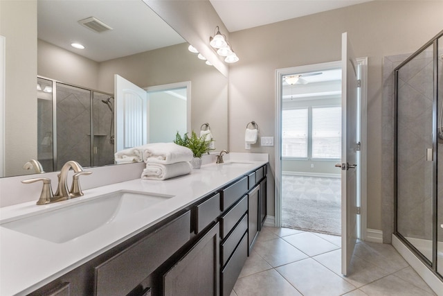2101 Flagship Ct, Frisco, TX 75036 - full bath featuring a shower stall, double vanity, and baseboards