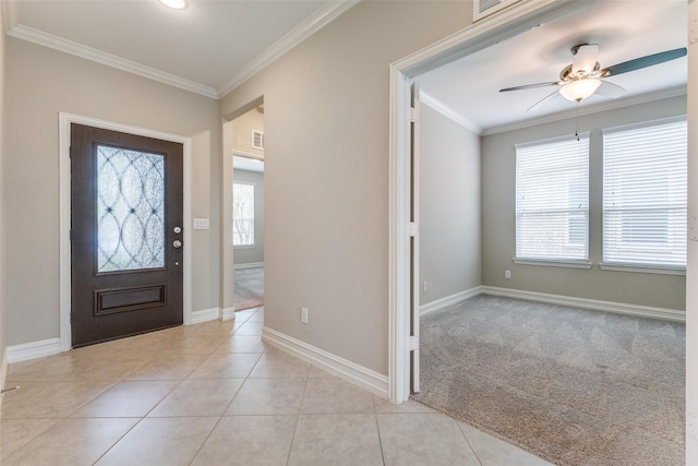 2101 Flagship Ct, Frisco, TX 75036 - foyer entrance with crown molding, a ceiling fan, baseboards, and light tile patterned flooring