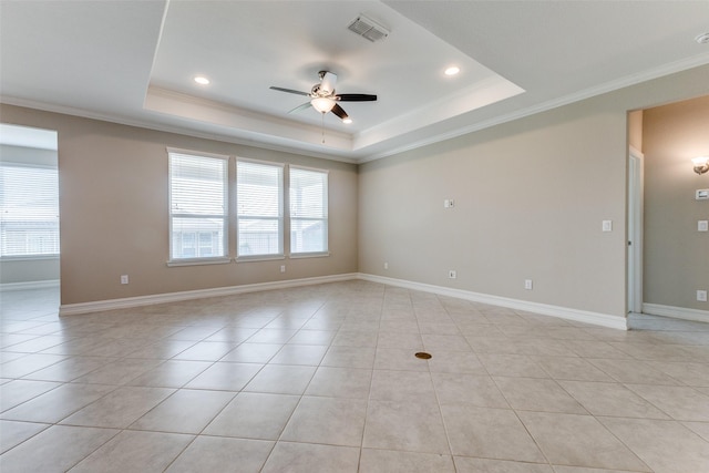 2101 Flagship Ct, Frisco, TX 75036 - unfurnished room featuring ceiling fan, light tile patterned floors, ornamental molding, a raised ceiling, and baseboards