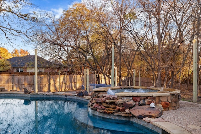view of swimming pool featuring a fenced in pool and a fenced backyard